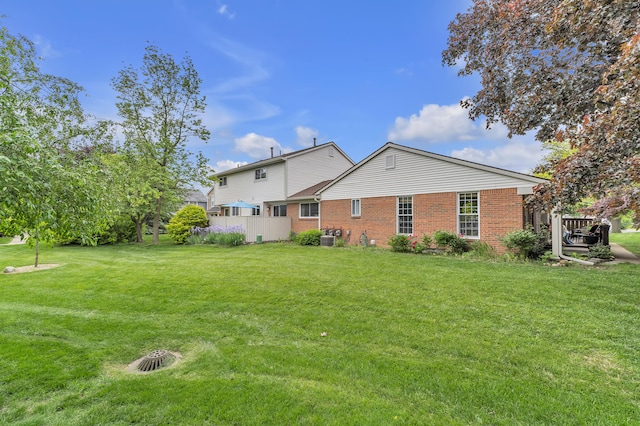 2840 Bombridge Ct, Ann Arbor, MI 48104 - back of house featuring brick siding and cooling unit