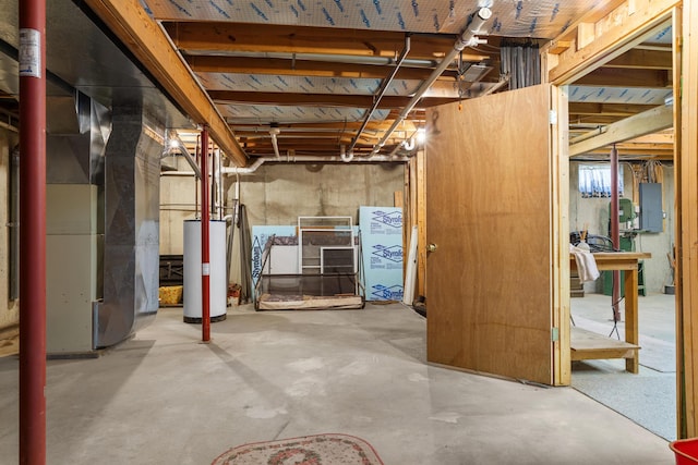 2041 Blackmer Dr, Jonesville, MI 49250 - unfinished basement with gas water heater, electric panel, and heating unit