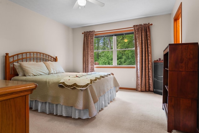 2041 Blackmer Dr, Jonesville, MI 49250 - bedroom with light carpet, ceiling fan, and baseboards