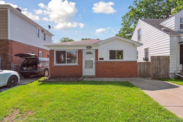 1623 Ethel Ave, Lincoln Park, MI 48146 - view of front facade featuring brick siding and board and batten siding