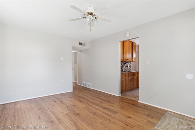1623 Ethel Ave, Lincoln Park, MI 48146 - unfurnished room featuring light wood finished floors and ceiling fan