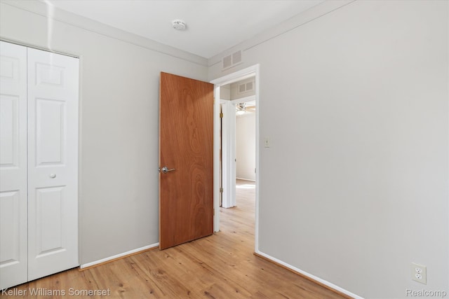 1623 Ethel Ave, Lincoln Park, MI 48146 - unfurnished bedroom featuring light wood finished floors and a closet