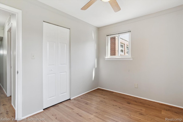 1623 Ethel Ave, Lincoln Park, MI 48146 - unfurnished bedroom featuring light wood-style flooring, a closet, and ceiling fan
