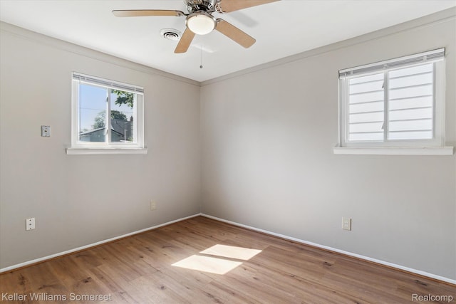 1623 Ethel Ave, Lincoln Park, MI 48146 - empty room with wood finished floors and ceiling fan