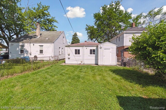 1623 Ethel Ave, Lincoln Park, MI 48146 - rear view of house with a fenced backyard and a shed
