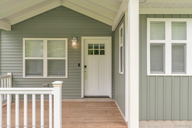 3565 Memoir Dr, Fort Gratiot, MI 48059 - doorway to property featuring board and batten siding and a porch