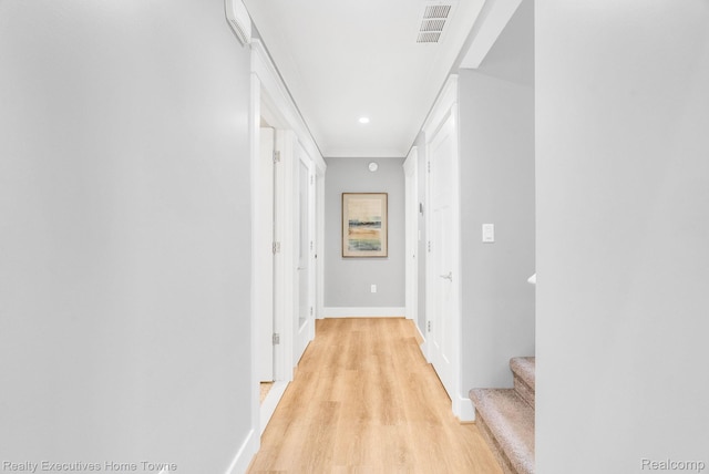 3565 Memoir Dr, Fort Gratiot, MI 48059 - hallway with light wood-type flooring, baseboards, and stairway