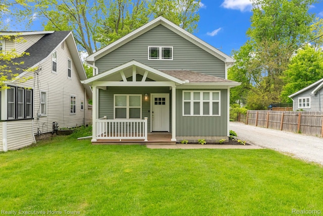 3565 Memoir Dr, Fort Gratiot, MI 48059 - view of front of house featuring a porch, board and batten siding, and roof with shingles