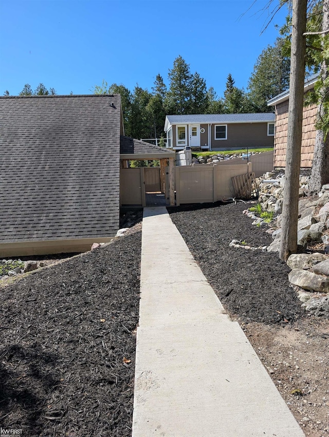 1422 Sims St, De Tour Village, MI 49725 - view of yard with a gate