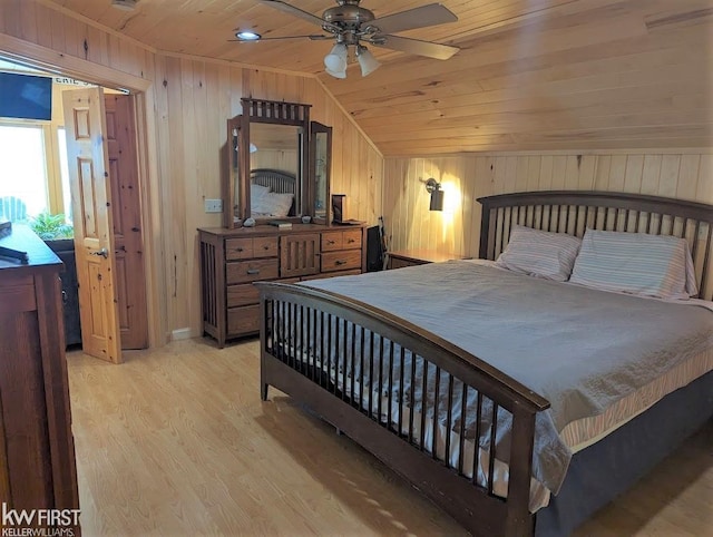 1422 Sims St, De Tour Village, MI 49725 - bedroom featuring vaulted ceiling, wood ceiling, wood walls, and light wood-type flooring