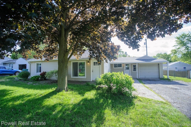 2575 Walnut Rd, Auburn Hills, MI 48326 - view of front of home with driveway and an attached garage