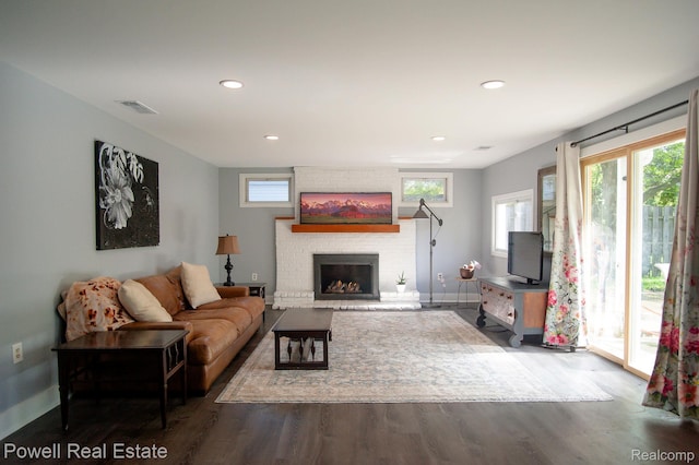 2575 Walnut Rd, Auburn Hills, MI 48326 - living area featuring wood finished floors, a fireplace, baseboards, and recessed lighting