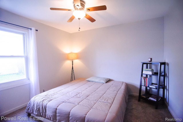 2575 Walnut Rd, Auburn Hills, MI 48326 - carpeted bedroom with baseboards and ceiling fan