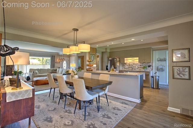 11555 Colpaert Dr, Warren, MI 48093 - dining space with dark wood-style floors, recessed lighting, and baseboards
