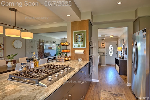 11555 Colpaert Dr, Warren, MI 48093 - kitchen featuring stainless steel appliances, wood finished floors, light stone countertops, recessed lighting, and pendant lighting