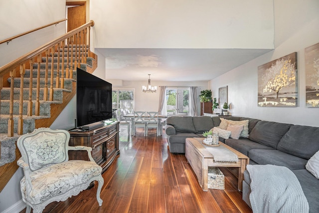 10210 Mizzen Ln, Pleasant Lake, MI 49272 - living area with stairway, hardwood / wood-style flooring, a chandelier, and a towering ceiling