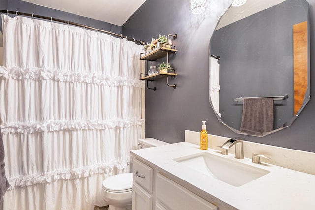 10210 Mizzen Ln, Pleasant Lake, MI 49272 - bathroom featuring toilet, vanity, and a shower with shower curtain