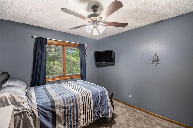 10210 Mizzen Ln, Pleasant Lake, MI 49272 - bedroom with carpet flooring, a textured ceiling, baseboards, and a ceiling fan