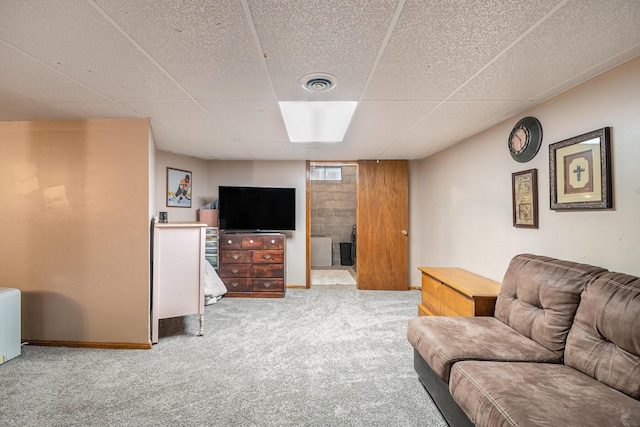 10210 Mizzen Ln, Pleasant Lake, MI 49272 - carpeted living room featuring a drop ceiling and baseboards
