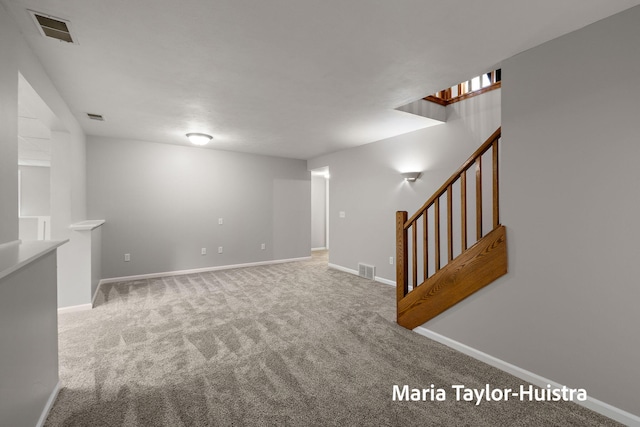 10130 64th Ave, Allendale, MI 49401 - basement featuring carpet floors, stairway, and baseboards