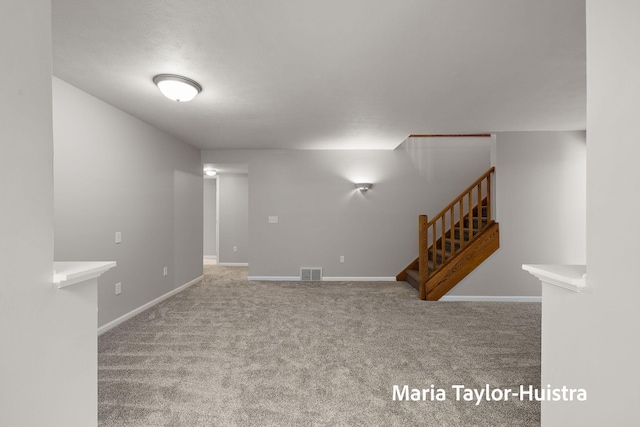10130 64th Ave, Allendale, MI 49401 - unfurnished room featuring carpet, stairs, and baseboards