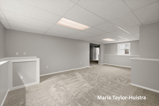 10130 64th Ave, Allendale, MI 49401 - carpeted empty room featuring a drop ceiling and baseboards