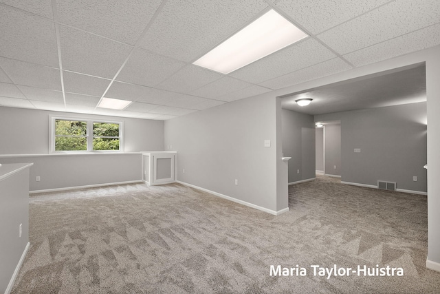 10130 64th Ave, Allendale, MI 49401 - basement featuring a drop ceiling, carpet flooring, and baseboards