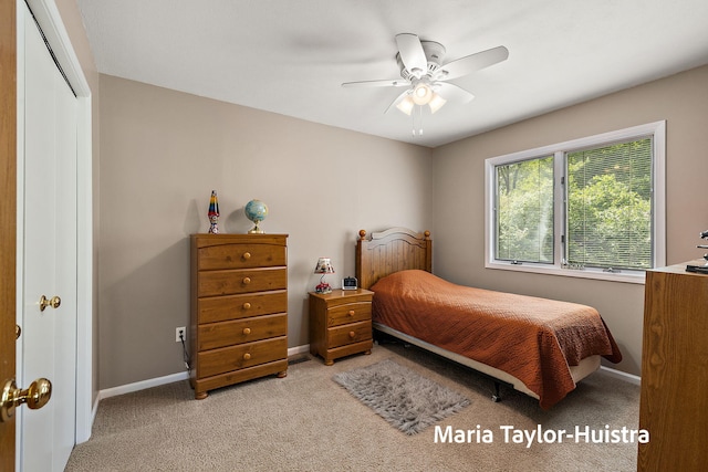 10130 64th Ave, Allendale, MI 49401 - bedroom featuring carpet, baseboards, and a ceiling fan