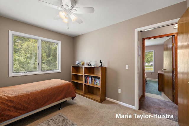10130 64th Ave, Allendale, MI 49401 - bedroom with carpet floors, baseboards, and a ceiling fan