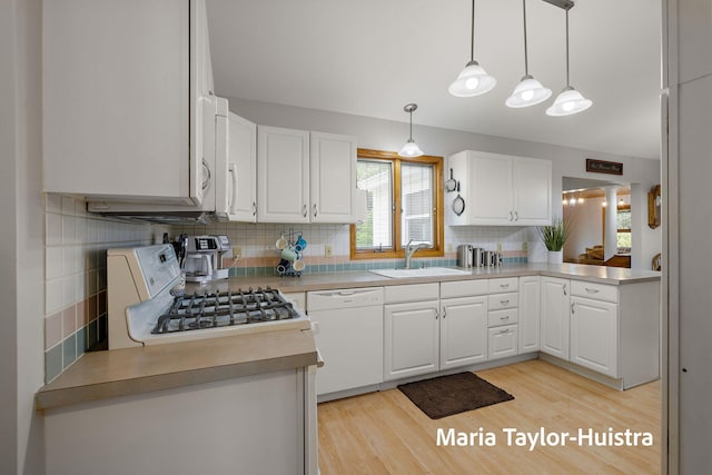 10130 64th Ave, Allendale, MI 49401 - kitchen featuring white appliances, a sink, backsplash, white cabinets, and light wood finished floors