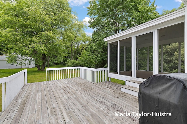 10130 64th Ave, Allendale, MI 49401 - wooden deck featuring a sunroom and a yard