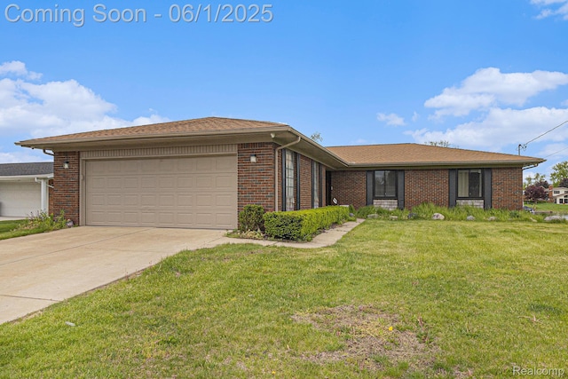687 Sunnybeach Dr, White Lake, MI 48386 - single story home featuring an attached garage, brick siding, a front lawn, and driveway