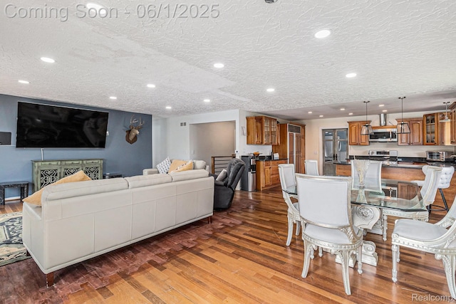687 Sunnybeach Dr, White Lake, MI 48386 - dining room featuring wood finished floors and recessed lighting