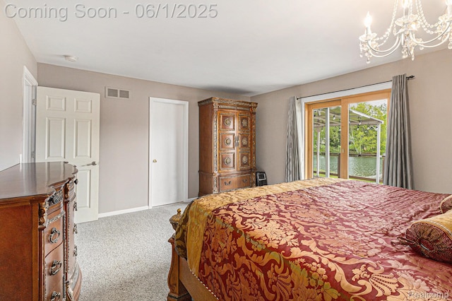 687 Sunnybeach Dr, White Lake, MI 48386 - carpeted bedroom featuring a chandelier, access to exterior, and baseboards
