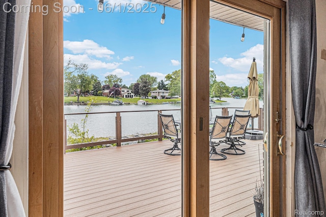 687 Sunnybeach Dr, White Lake, MI 48386 - wooden terrace featuring a water view