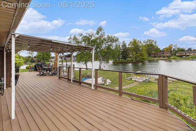 687 Sunnybeach Dr, White Lake, MI 48386 - wooden terrace with a water view