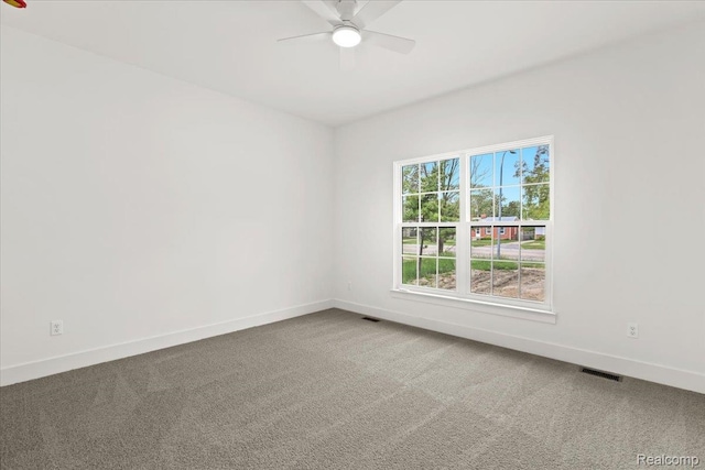 11308 Merriman Rd, Livonia, MI 48150 - carpeted spare room with ceiling fan and baseboards
