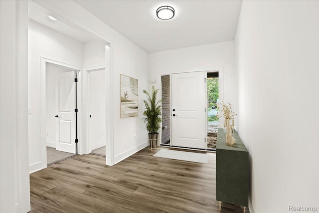 11308 Merriman Rd, Livonia, MI 48150 - entryway featuring wood finished floors and baseboards