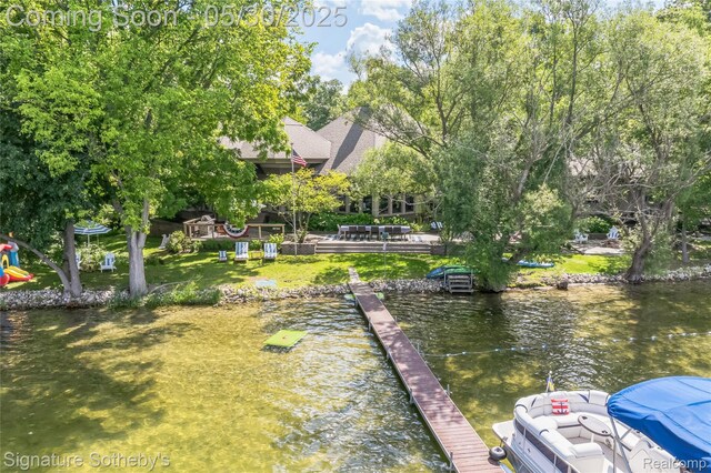 401 Glazier Rd, Chelsea, MI 48118 - water view with a dock
