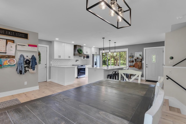 9275 M-50, Onsted, MI 49265 - dining area with a chandelier, light wood-style floors, baseboards, and recessed lighting