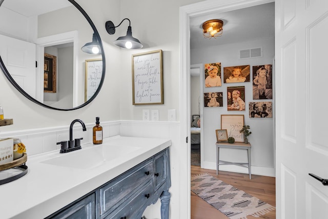 9275 M-50, Onsted, MI 49265 - ensuite bathroom featuring wood finished floors and vanity