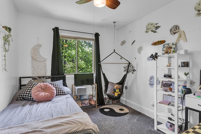 9275 M-50, Onsted, MI 49265 - carpeted bedroom featuring a ceiling fan and baseboards