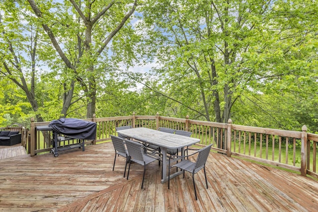 9275 M-50, Onsted, MI 49265 - wooden terrace with outdoor dining area and grilling area
