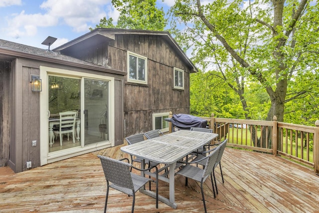9275 M-50, Onsted, MI 49265 - deck featuring outdoor dining space and a grill
