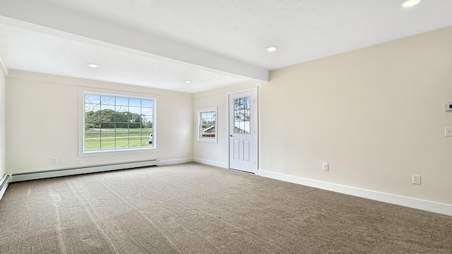 1972 W Cedar Dr, Mcbain, MI 49657 - carpeted empty room featuring baseboards, recessed lighting, and a baseboard radiator