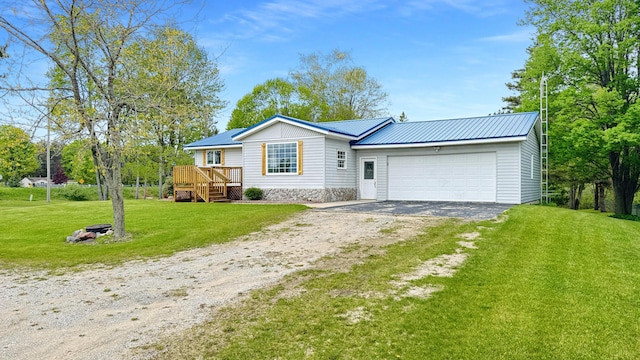 1972 W Cedar Dr, Mcbain, MI 49657 - ranch-style house featuring dirt driveway, a garage, a front yard, a wooden deck, and metal roof