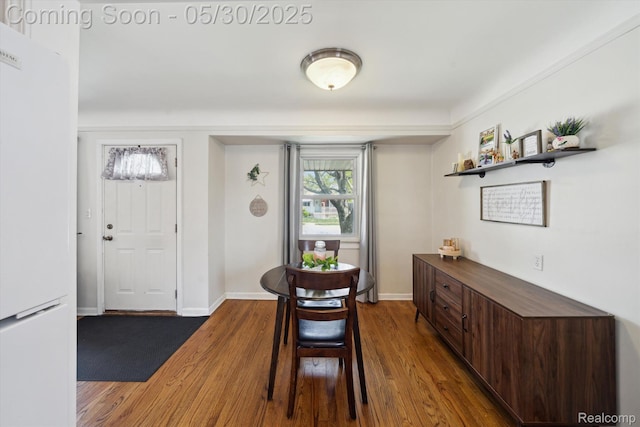 15645 Warwick Ave, Allen Park, MI 48101 - dining area with dark wood finished floors and baseboards