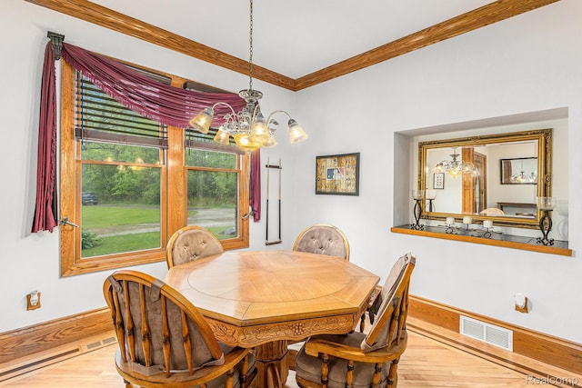 6140 Seymour Rd, Swartz Creek, MI 48473 - dining space with a chandelier, baseboards, wood finished floors, and crown molding