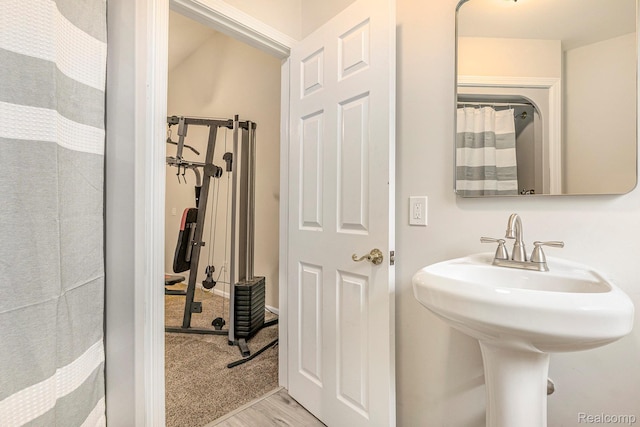 6140 Seymour Rd, Swartz Creek, MI 48473 - bathroom featuring wood finished floors