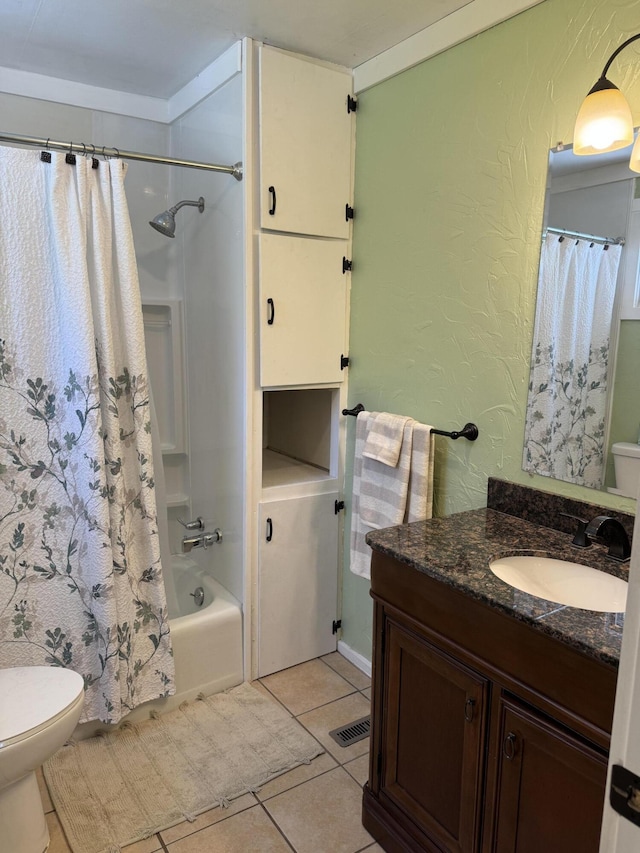 12227 Wise St, Bear Lake, MI 49614 - bathroom featuring toilet, vanity, tile patterned flooring, shower / bathtub combination with curtain, and a textured wall